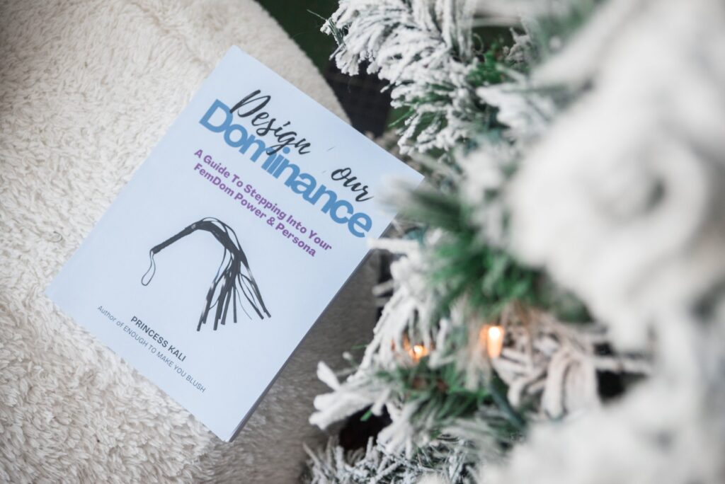 The front cover of the Design Your Dominance: A Guide Into Stepping Into your FemDom Power & Persona book