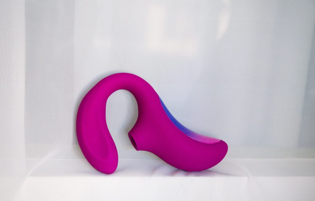The LELO Enigma Cruise up against a white background. The pink and purple coloration stands out beautifully against a simple white backdrop, and the focus is entirely on the toy. For my LELO Enigma Cruise review.