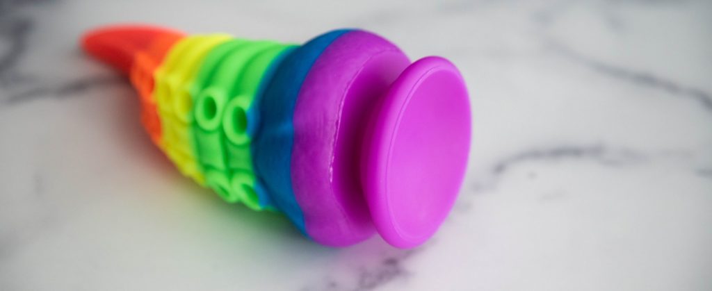 Close up of the suction cup base on the bottom of the dildo. It looks very large and flexible which aids in it sticking so well to surfaces. For my Laphwing Tentacle review.