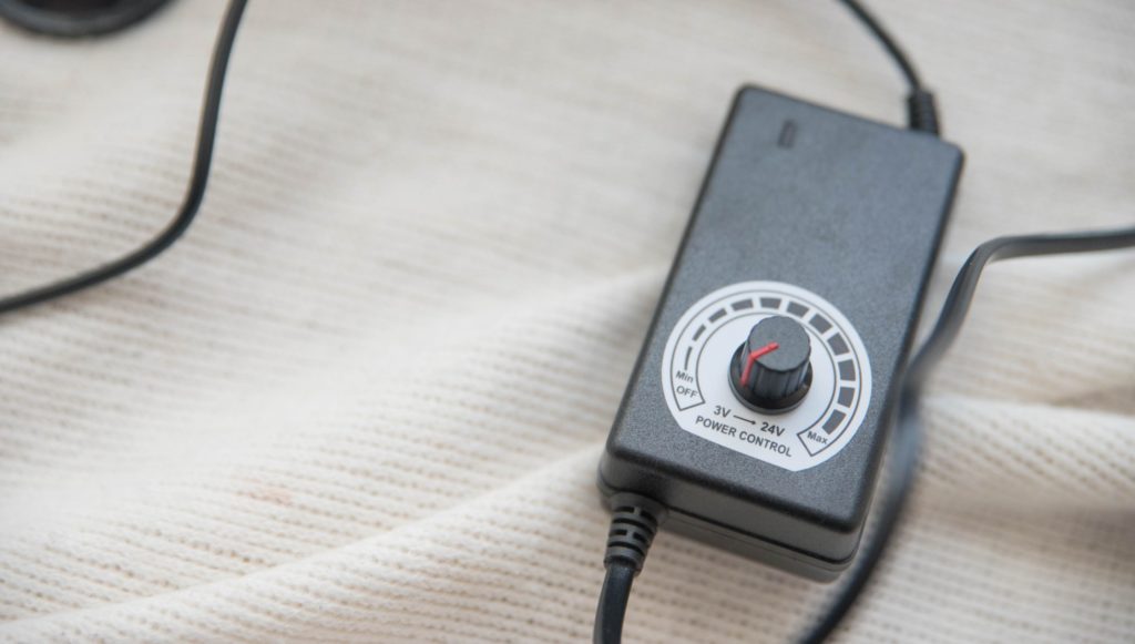 Close-up of the attached remote that allows for control of the thrusting. It's a simple manual turn dial that allows the user to go from 3V to 24V thrusting power. For Hismith Sex Machine Review 3XLR version.