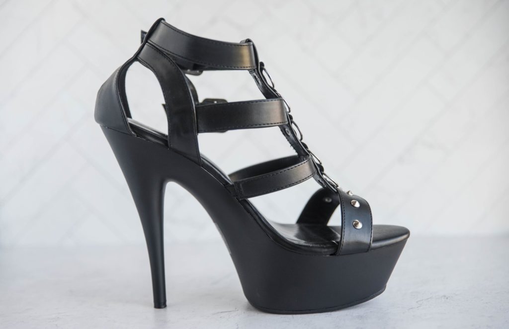 Side view of the heel. It has a relatively low platform, but it's a platform. The tip of the toebox is rounded for easier pivoting. It has a stilletto, rounded heel. For my Lapdance Open Toed Studded Platform Heels review.
