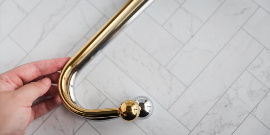 Close-up of the difference in ball diameters between the Lockink anal hook and a standard anal hook. Both have the same curve though. LOCKINK Adjustable Golden Anal Hook review.