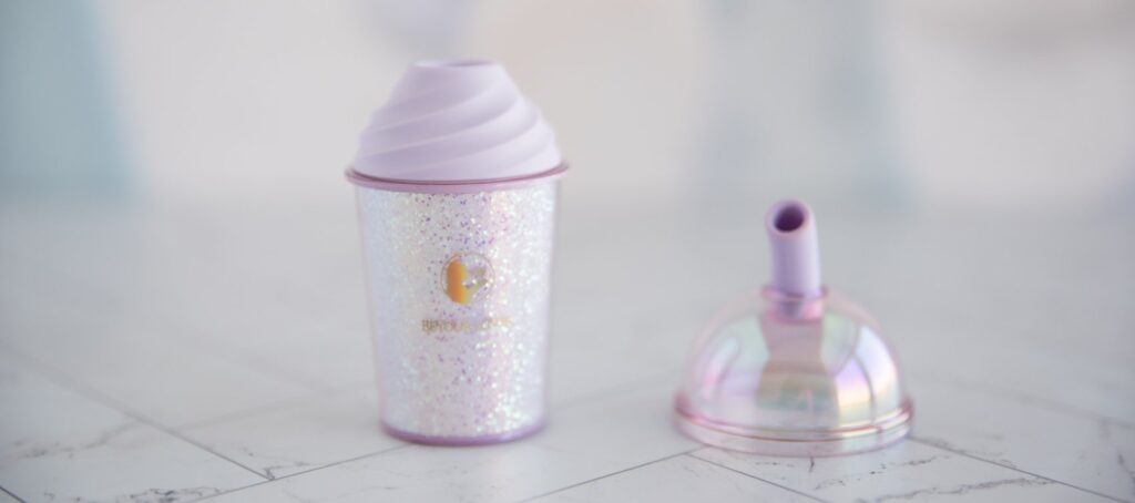 The lid for the toy is removed, showcasing how the toy looks without the lid (and it's "straw") on top of the toy. For my BeYourLover Joy Cup review.