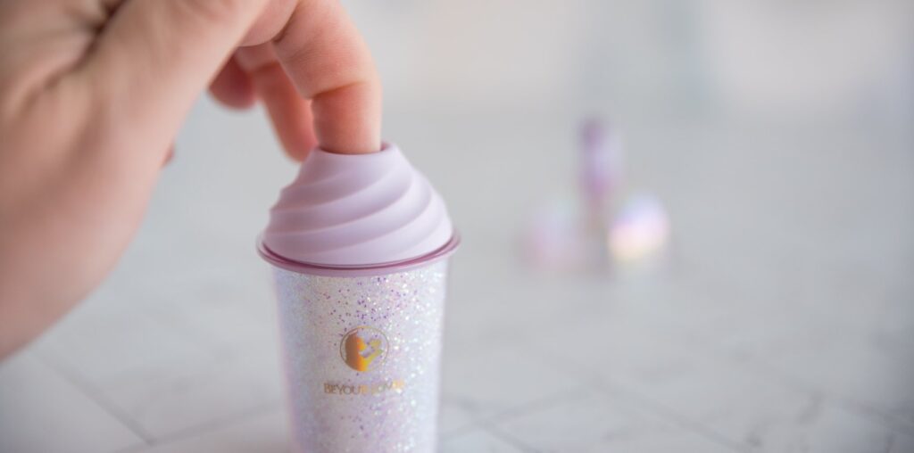 I stick my finger into the open hole tip at the top of the toy. My pointer finger fits in easily.