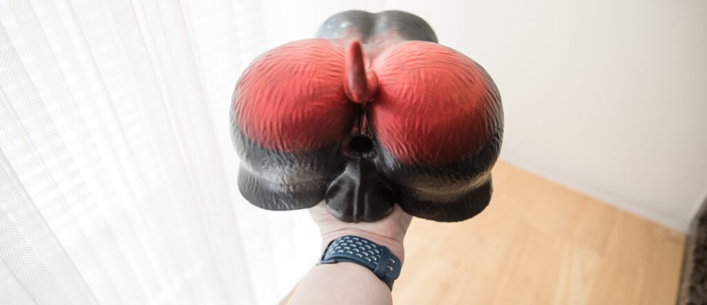 The Naberus rests on top of my hand. It's noticeably larger than the width of my hand, but it's not so big that it can't be held with the single hand. For my Twisted Beast Naberus review.