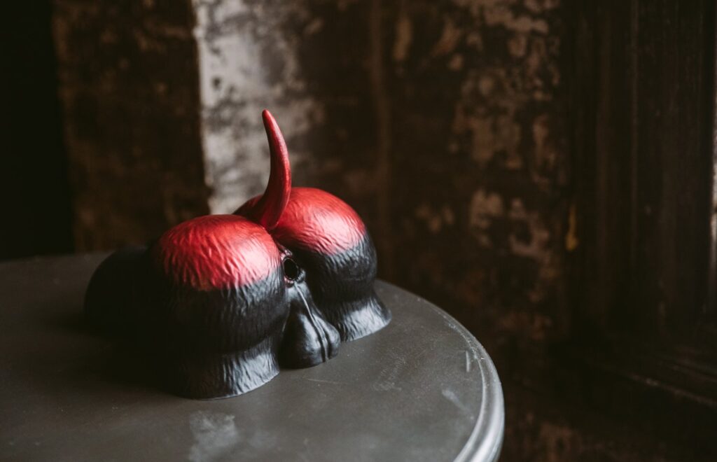 The Naberus lays out on top of a tabletop. It has a shiny, curvy butt to it with a pair of obvious, easy-to-see testicles. For my Twisted Beast Naberus review.