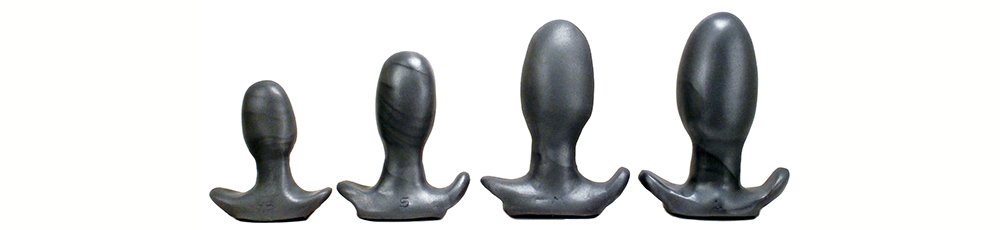 Four of the Egg Plugs from Square Peg Toys in Graphite/gray coloring shown sitting next to one another. For my How to Choose the Best Toys for Anal Stretching article.