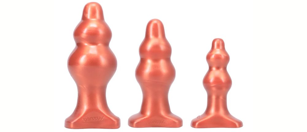 The three Tantus Severin plug sizes sitting out next to one another