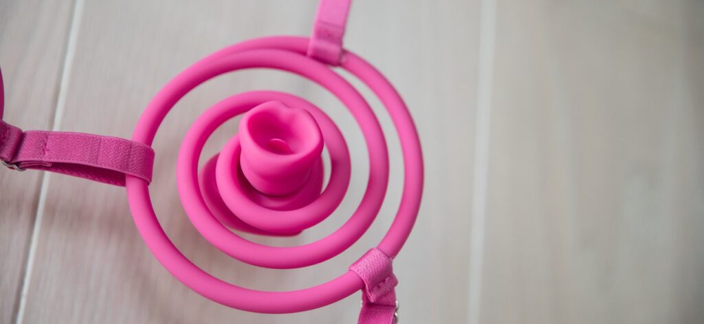 Close up on the wearer's side of the tongue and lips attachment. There's a small flicking tongue inside of the lips.