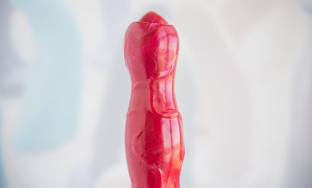 Close-up on the tip of the toy, showcasing the unique texture at the tip alongside the very pronounced veins. For my Juliet Toys PupJoy review.