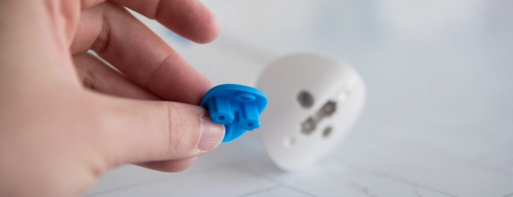 A close-up on the base of the Magic Wand Waterproof. The "waterproof" cap is removed, showcasing how it fully removes from the base of the wand. For my Magic Wand Waterproof review.