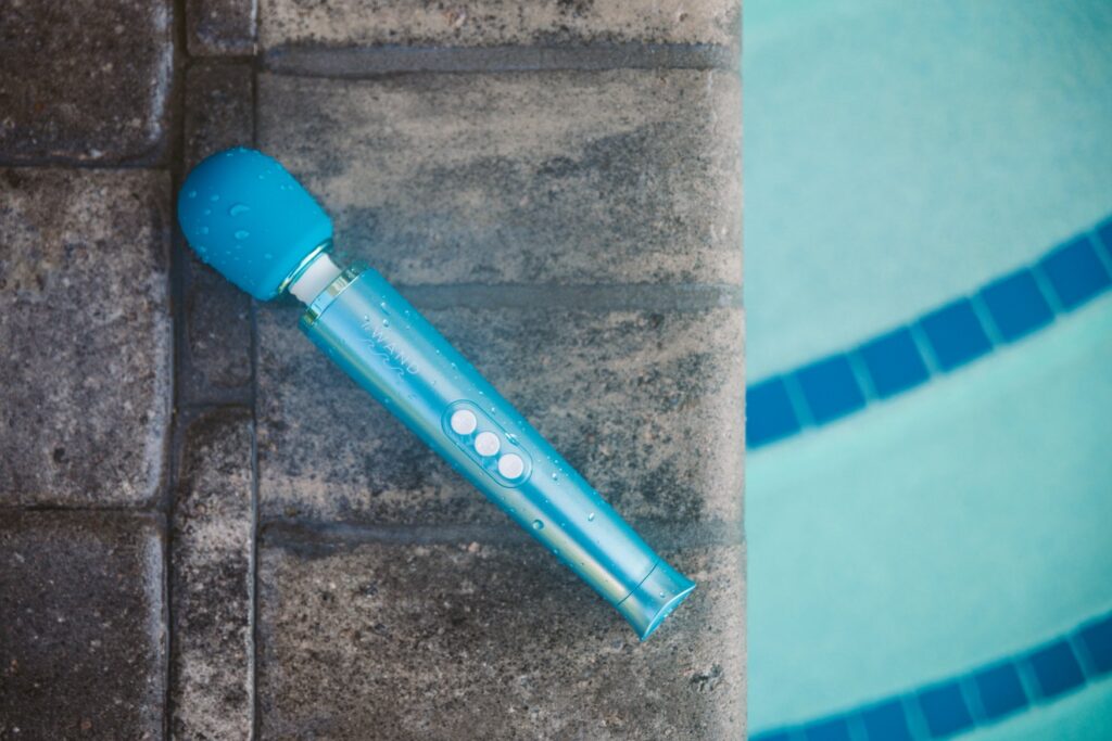 The beautiful blue of the Le Wand Dive stands out resting poolside with a blue chlorinated pool in the background. For my Le Wand Dive review.