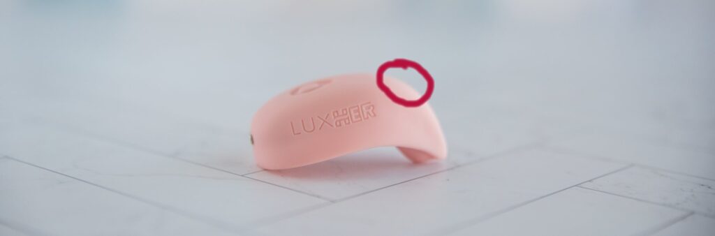 Luxus Review image. A hand-drawn digital circle is shown circling the spot on the LuxHer that receives data from the LuxHim.