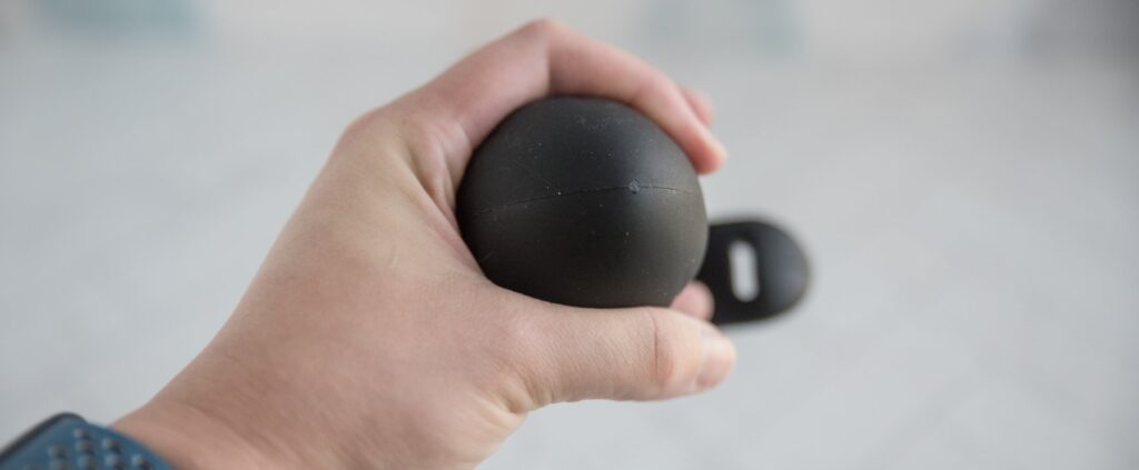 My hand wraps around the thickest shaft of the butt plug. My fingers can't touch because the plug is so thick. For my MEO.de Full Load Butt Plug review.