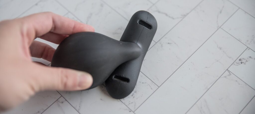 Top down view of the two holes built into the base of the plug, allowing the plug to be used with a butt plug harness. For my MEO.de Full Load Butt Plug review.