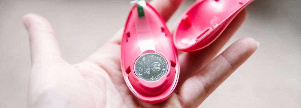 Close up on the inside of the battery in the physical remote. It's powered by a CR2032 battery, not rechargeable. For my VVD Rider Desire review.