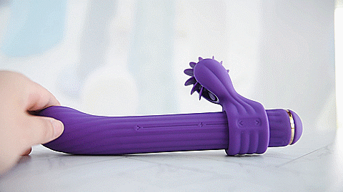 GIF shows the rotating licking tongue clitoral attachment making its licking motion with the toy turned on. For my AVIDLOVE PLAY Four-Attachment Rabbit Vibrator review.