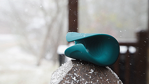 GIF showing the Gush 2 sitting on a ledge as it snows around the vibrator. For my Lovense Gush 2 review.