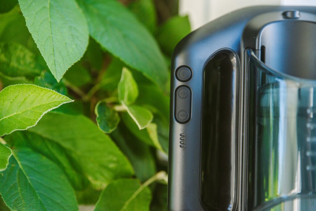 Close-up of the buttons on the left handle. There are three distinct buttons as well as a four-bar LED light to showcase the power level at all times. For my SVAKOM Jetpack review.
