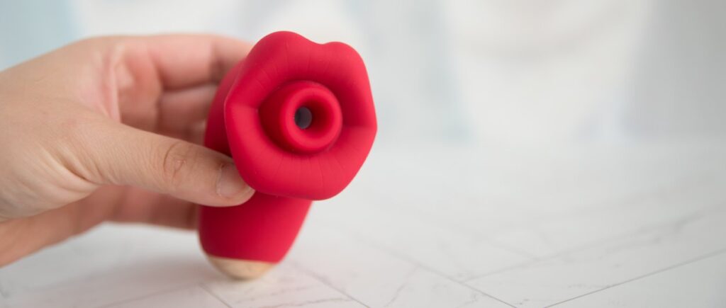 The lips and the air suction hole face the camera. From this angle, you can see down the hole to see it's hollow inside. For my AVIDLOVE PLAY Kiss Air Pulse Vibrator Review.